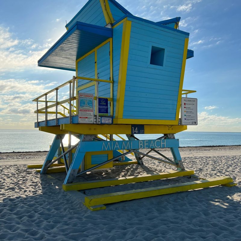 a boat sitting on top of a beach