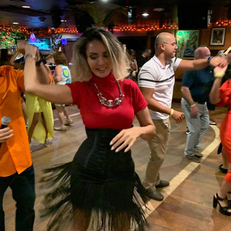 a group of people standing in front of a crowd