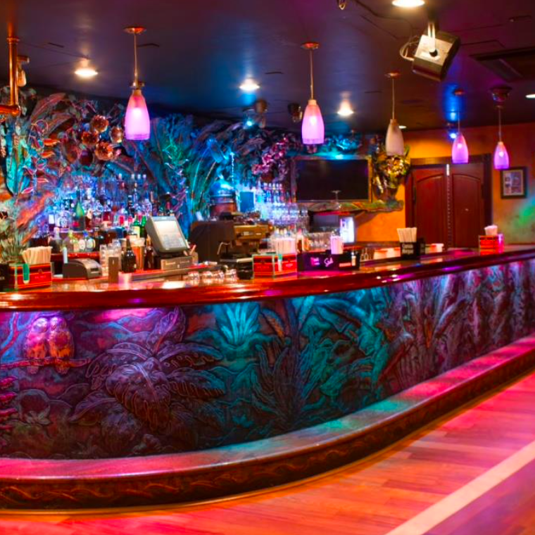 a group of people performing on a counter