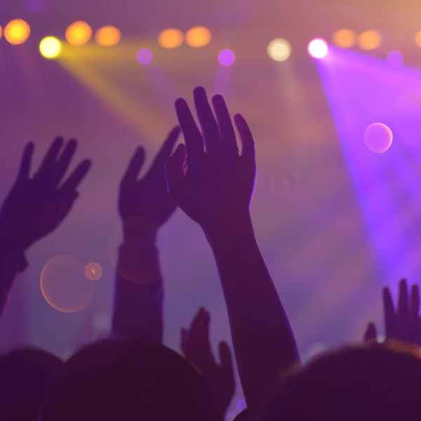 a person sitting on a stage