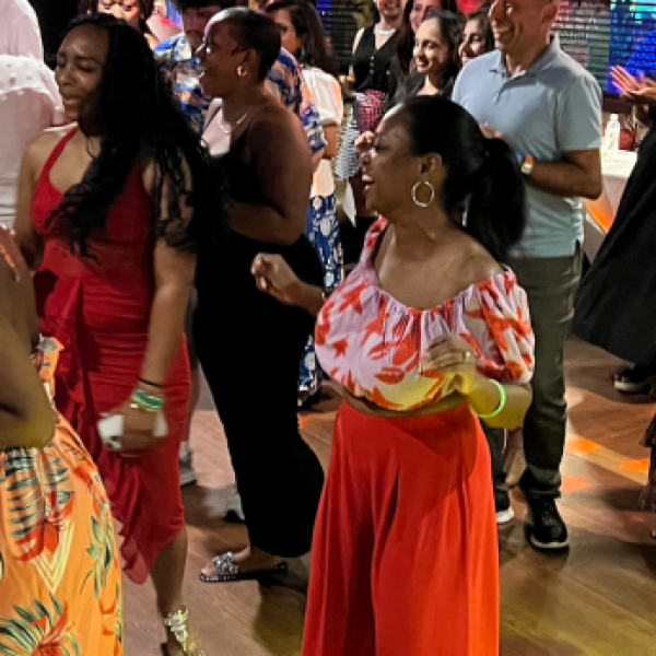 Group salsa dancing during the Salsa Mia Miami Beach nightlife experience for visitors