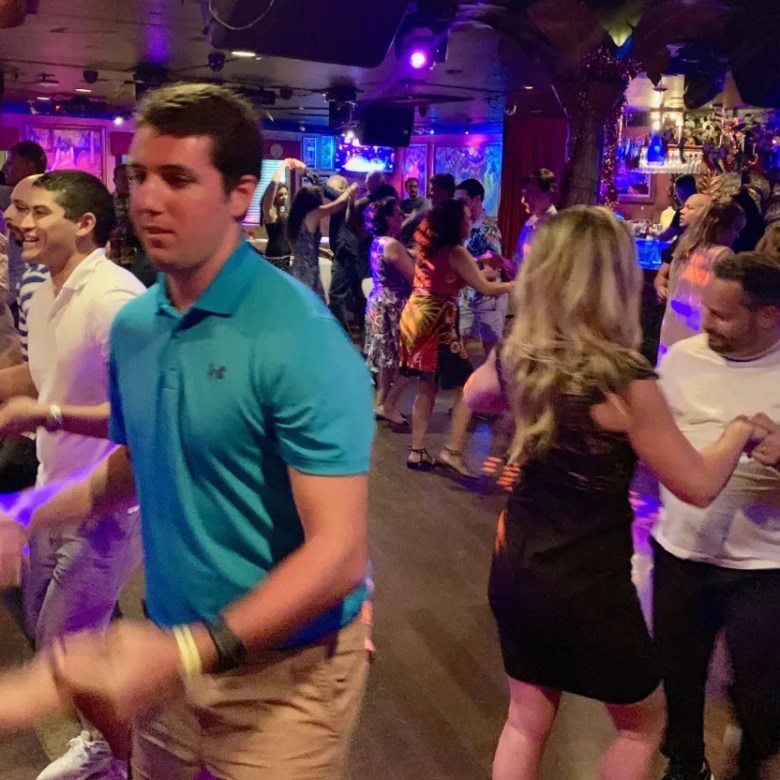 Interactive salsa dancing party at Salsa Mia Miami Beach nightlife experience